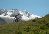 MTB ascent with Gran Paradiso in the background 